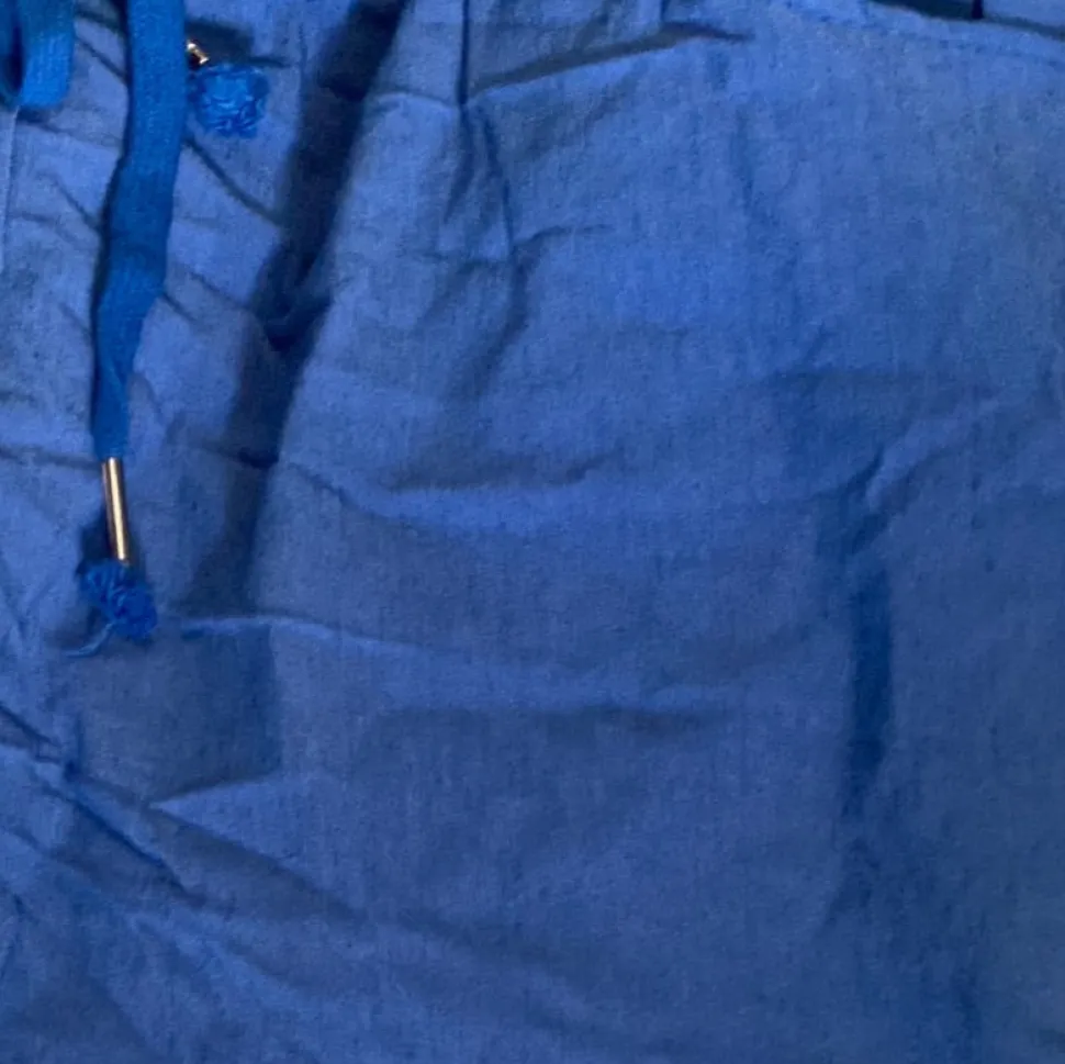 magic_trousers_in_plain_s_7.webp Magic Trousers in Plain shades of Blue