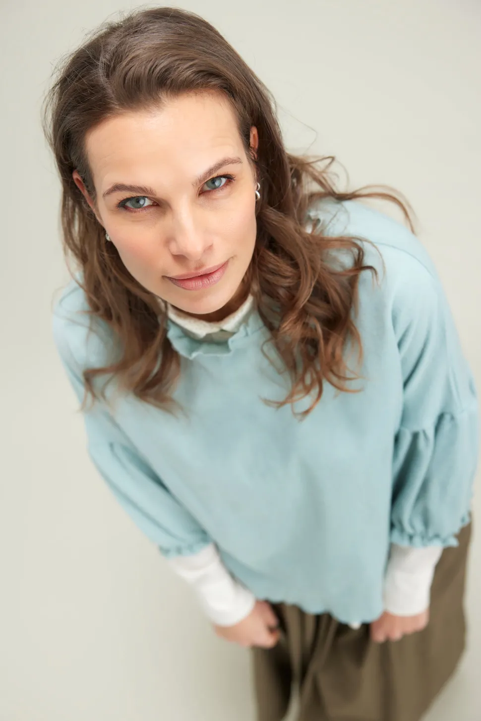 merino_wool_ruffle_neck_w_12.webp Merino Wool Ruffle Neck Wide Top in Indigo Blue and Earth Brown