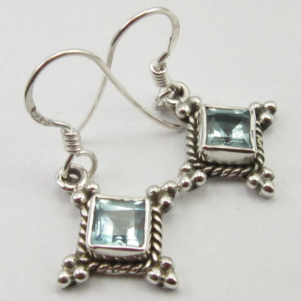 solid_silver_blue_topaz_d_2.webp Solid Silver Blue Topaz Diamond shaped Drop Earrings