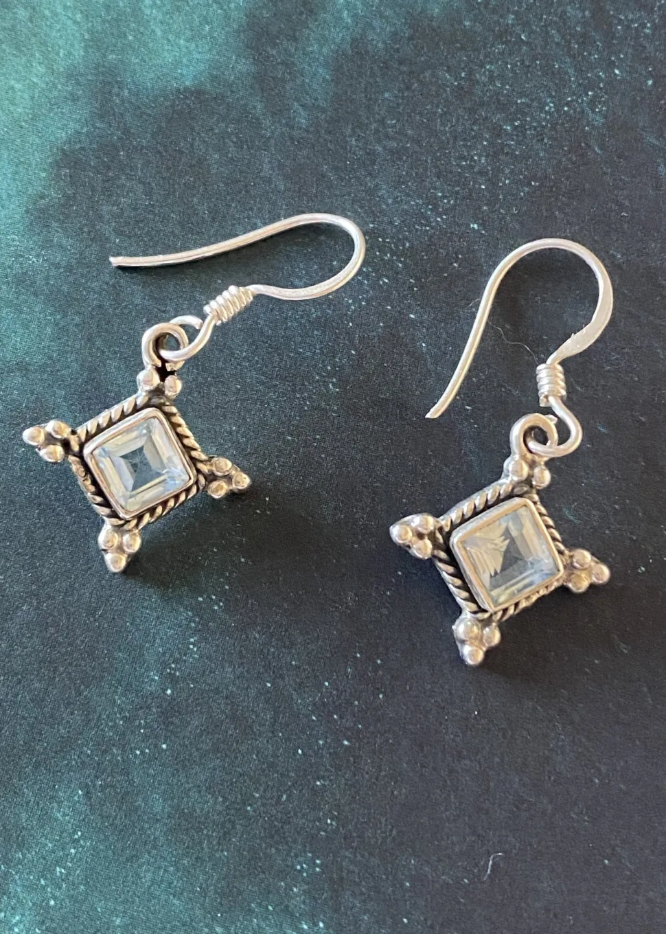 solid_silver_blue_topaz_d_3.webp Solid Silver Blue Topaz Diamond shaped Drop Earrings