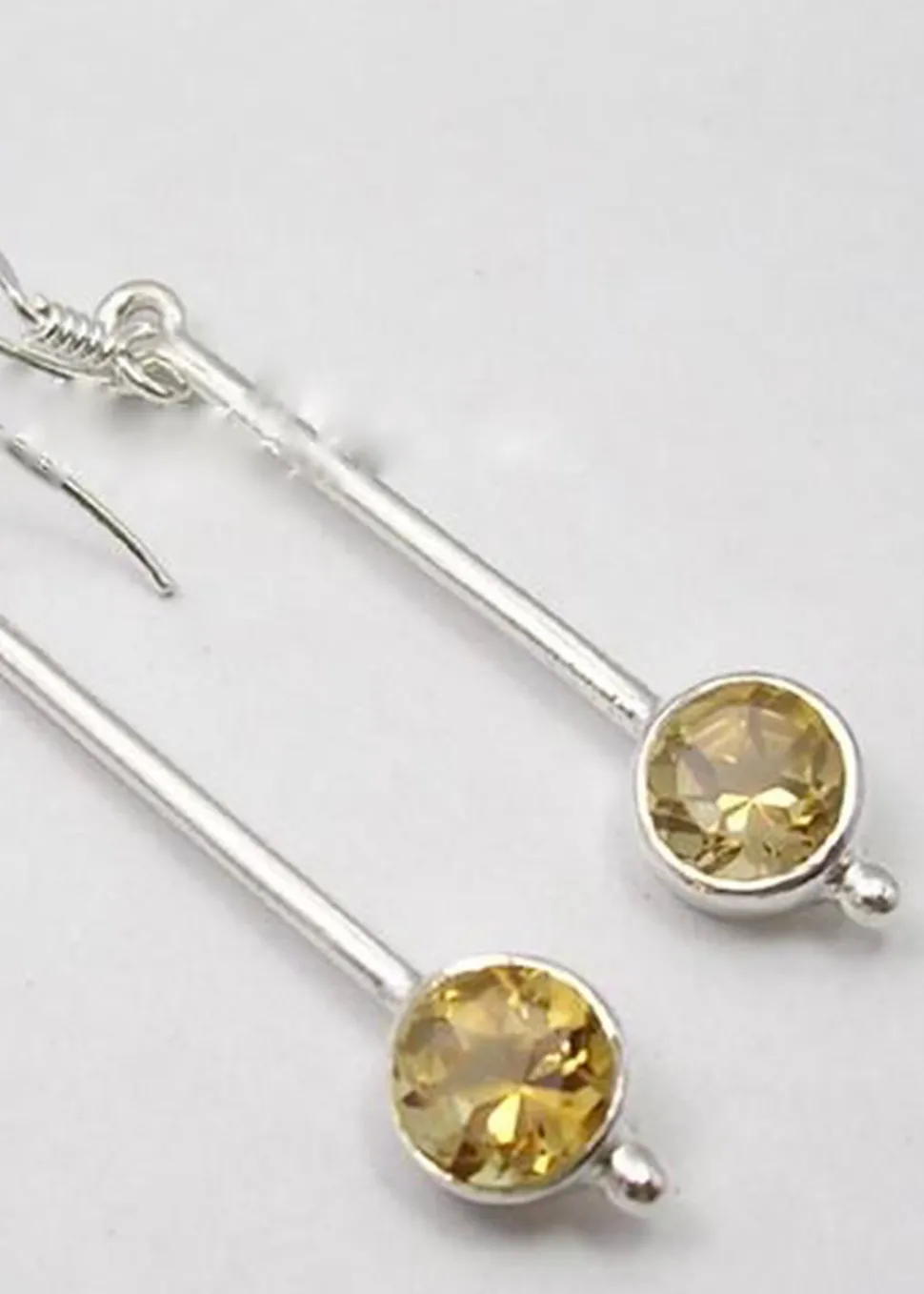 solid_silver_citrine_long_0.webp Solid Silver Citrine Long Drop Faceted Earrings