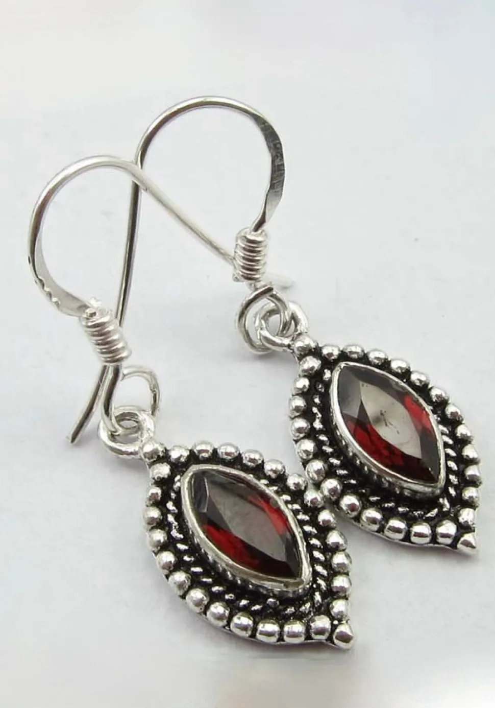 solid_silver_garnet_ellip_0.webp Solid Silver Garnet Ellipse Drop Earrings