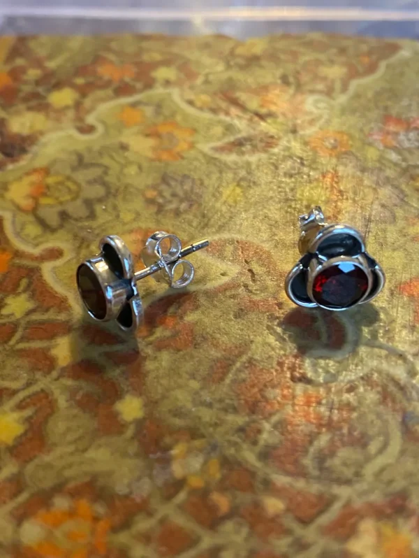 Solid Silver Garnet Stud Earrings with Triple Curve Frame