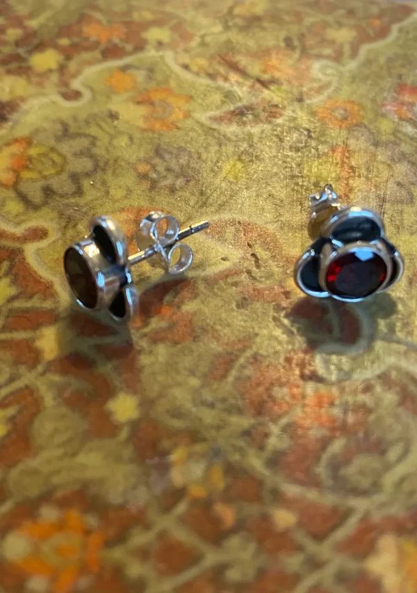Solid Silver Garnet Stud Earrings with Triple Curve Frame