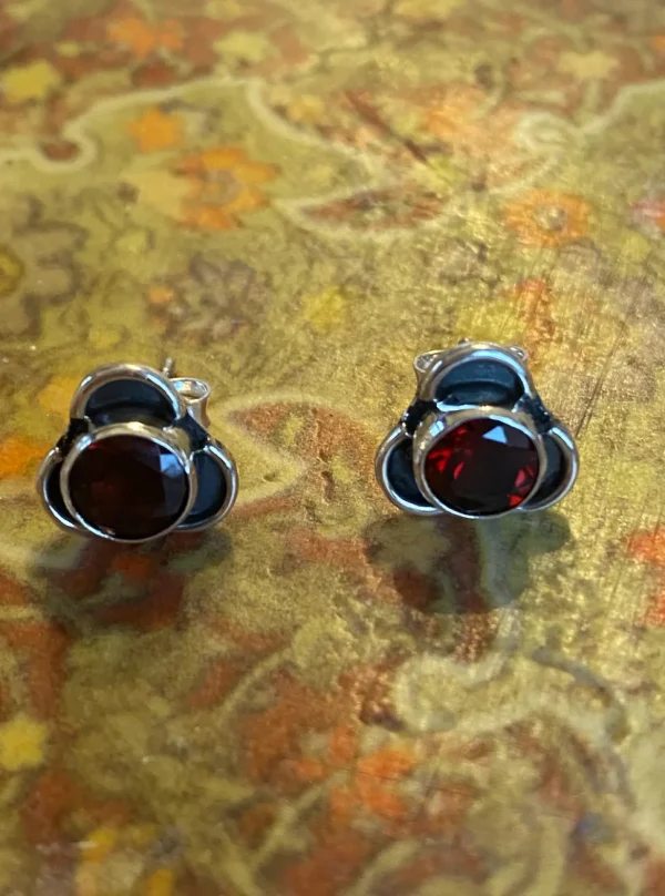Solid Silver Garnet Stud Earrings with Triple Curve Frame