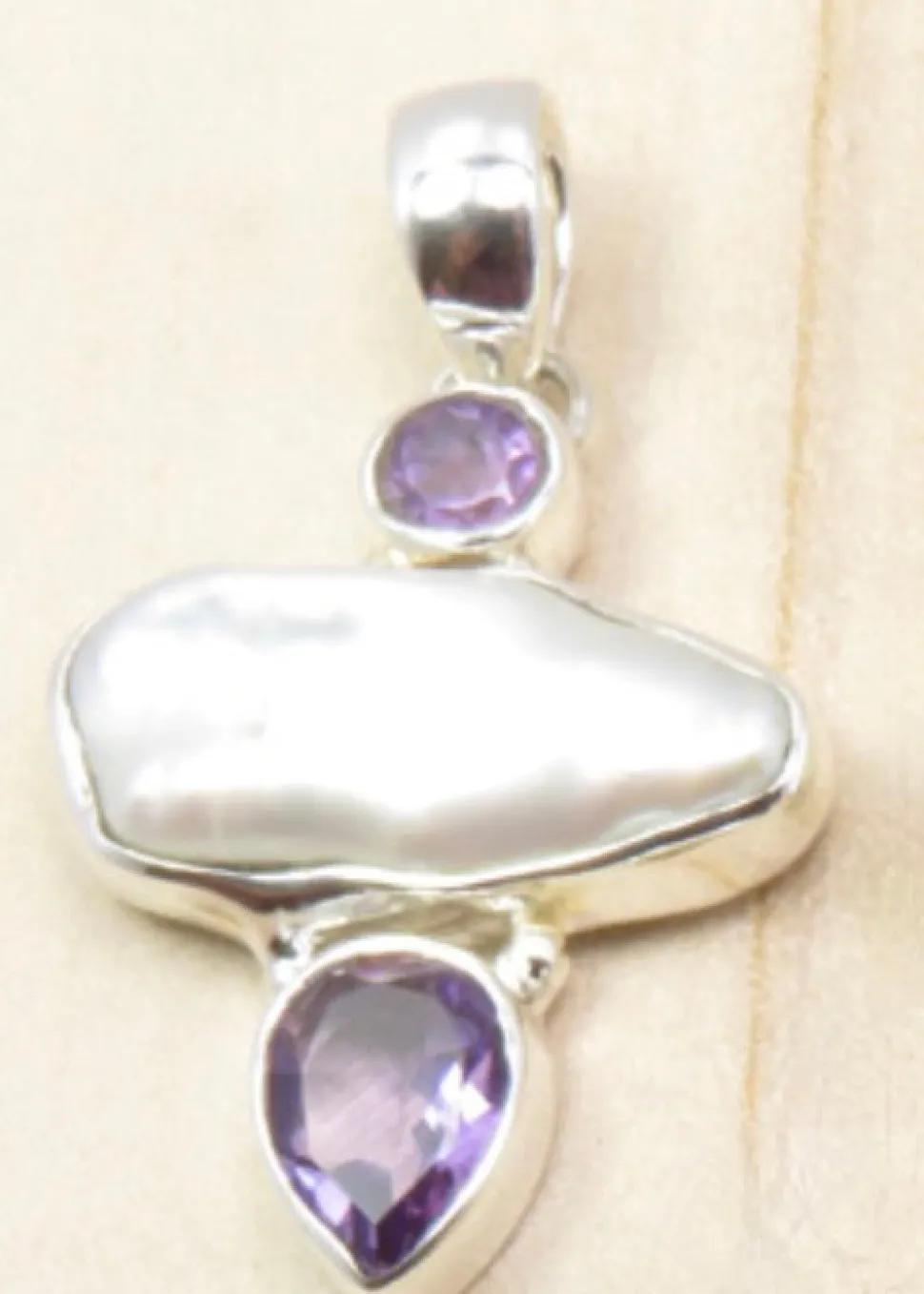 solid_silver_handmade_biw_3.webp Solid Silver Handmade Biwa Pearl Pendants