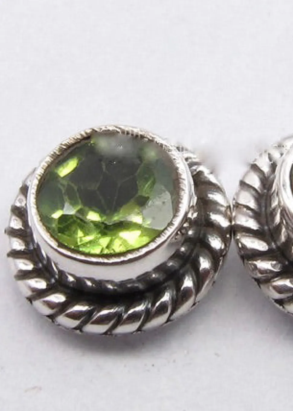 solid_silver_peridot_roun_2.webp Solid Silver Peridot Round Stud Earrings