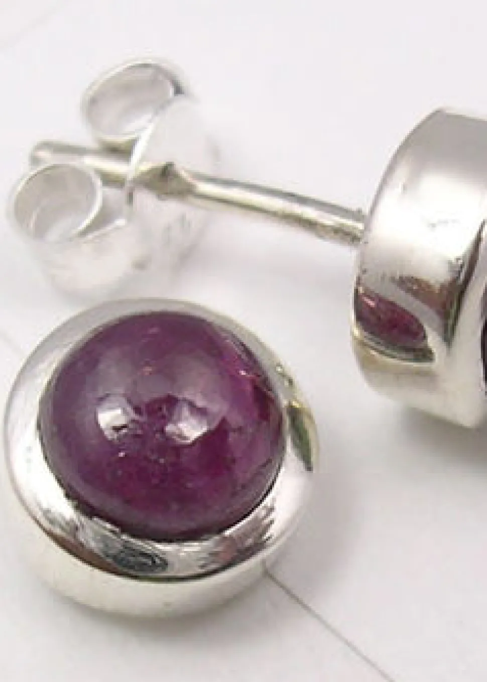 solid_silver_ruby_stud_ea_1.webp Solid Silver Ruby Stud Earrings